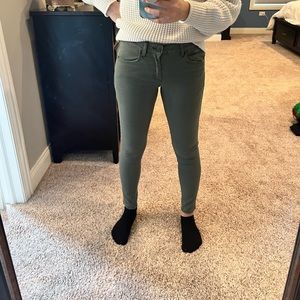Faded sage green jeggings.